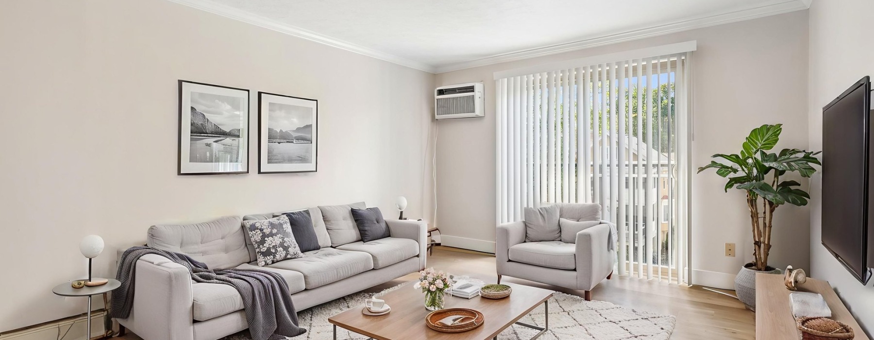 a living room with a couch and a table
