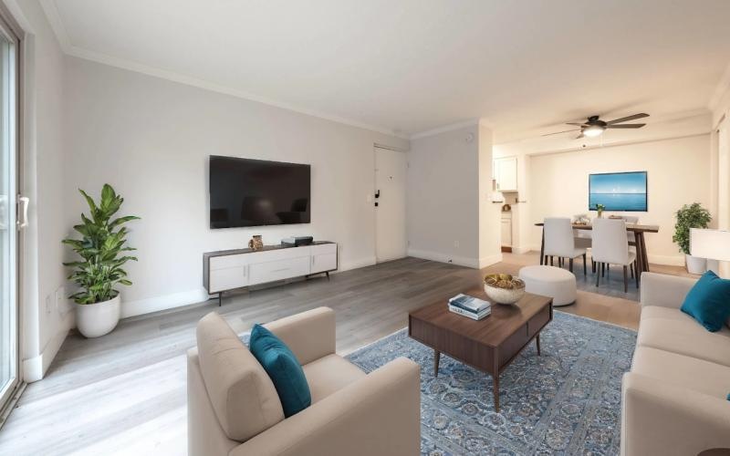 a living room with a tv and furniture