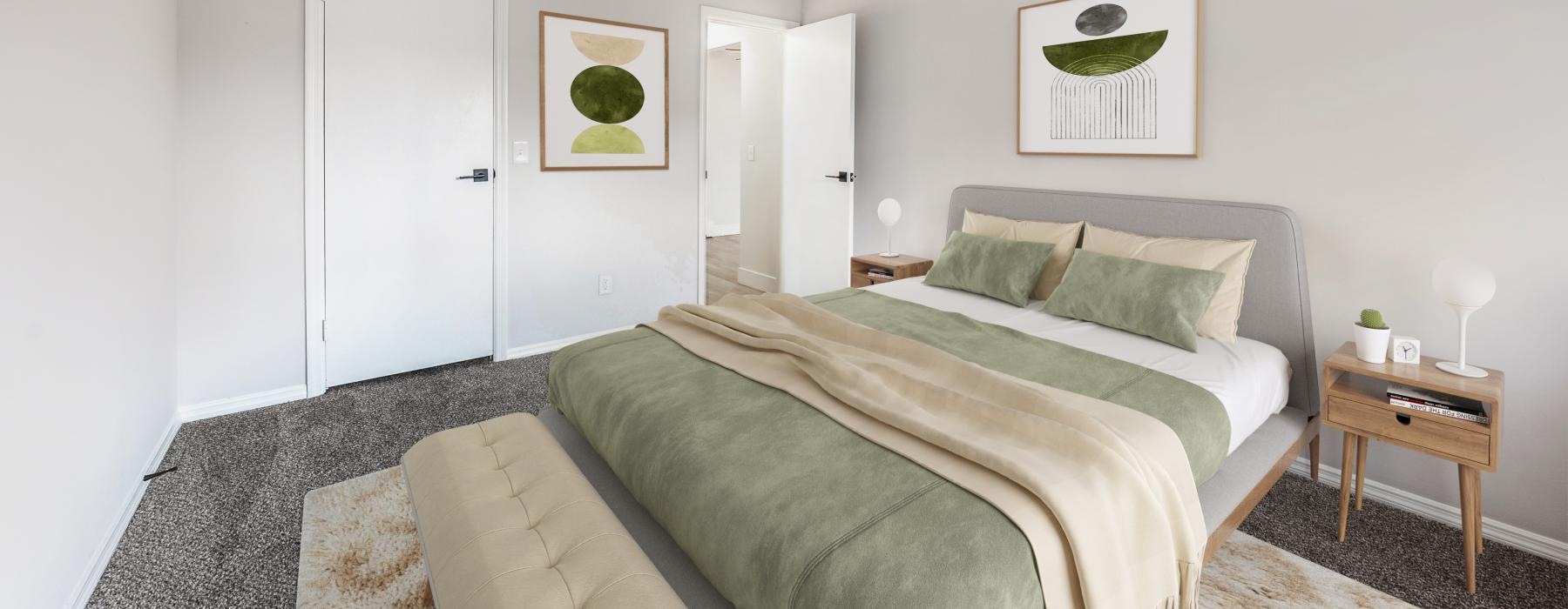 a bedroom with a bed and a couch